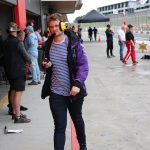 Man walking outside wearing headset