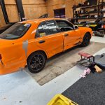 dented car in a workshop